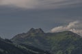 Summer valley with Grossarler Ache small river and blue cloudy sky