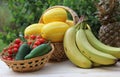 Summer Vegetable Harvest - Ginkaku Korean Melons with Pineapple, Bananas, Jalapeno Peppers and Tomato Royalty Free Stock Photo