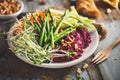 Summer Vegetarian Salad with Beetroots Hummus, Green Asparagus, Carrots, Cucumber and Germinated Seeds. Royalty Free Stock Photo