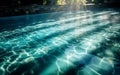 Moody blue ripped water swimming pool with long shadows. Royalty Free Stock Photo
