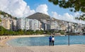 Summer view of alley with palms in Saranda Albania, Promenade walkway by the beach with date palms and restaurants Royalty Free Stock Photo