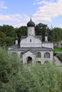 The summer view of the beautiful Russian Orthodox Church with domes and crosses surrounded by trees. Royalty Free Stock Photo