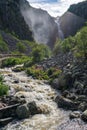 Summer view of the beautiful waterfall Njupeskar in northern Sweden Royalty Free Stock Photo