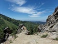 Bogus Basin Ski area Boise National Forest from rock outcrop Mores Mountain Loop cirrus clouds summer horizontal