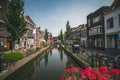 Flowers and canal in Gouda, Netherlands