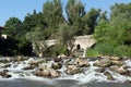 Summer view of Kadin most - a 15th-century stone arch bridge over the Struma River at Nevestino, Bulgaria Royalty Free Stock Photo