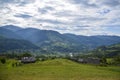 Summer view of the mountain village. Picturesque morning scene in the Carpathian mountains, Kvasy village Royalty Free Stock Photo