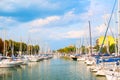 Summer view of pier with ships, yachts and other boats in Rimini, Italy