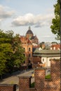 Summer view of Wawel Royal Castle in Krakow, Poland. Historical place in Poland. Flowers on foreground. Beautiful Royalty Free Stock Photo