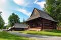 Summer view of wooden folk house located in forests  museum Skanzen of Orava Village, Zuberec, Slovakia. Orava Skanzen Royalty Free Stock Photo