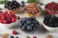 Summer vitamin food concept, set of various berries - blueberry, raspberry, blackberry, red white and black currant in Royalty Free Stock Photo