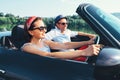 Summer voyage in cabriolet car: couple in love ride in car Royalty Free Stock Photo