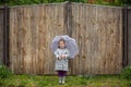 Summer walk in the rain little girl with an umbrella Royalty Free Stock Photo