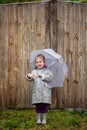 Summer walk in the rain little girl with an umbrella Royalty Free Stock Photo