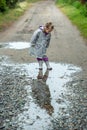 Summer walk in the rain little girl with an umbrella Royalty Free Stock Photo