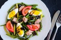 Warm salad with green beans, tuna, tomatoes and boiled eggs Royalty Free Stock Photo