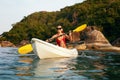 Summer Water Sport. Woman Traveling In Kayak Near Green Island Royalty Free Stock Photo