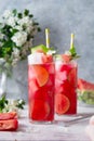 Summer watermelon refreshing drink with lime and soda. Delicious cocktail cold fruit drink