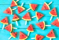 the summer watermelon slice popsicles on a blue rustic wood back Royalty Free Stock Photo