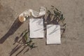 Summer wedding stationery, birthday mock-up scene. Blank greeting cards, oleander blossom, ribbon and olive tree