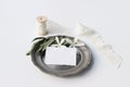 Summer wedding stationery mock-up scene. Blank greeting or RSVP card, invitation, silver plate with olive branch, white