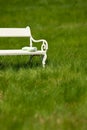 Summer - White bench in green meadow