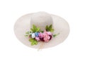 Summer woman hat with decorative plastic colorful inflorescences flowers isolated on white background with clipping path