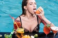 Summer woman with refresh alcohol in miami. Drink fresh vitamin juice, diet. Pool party relax in spa resort. Summer Royalty Free Stock Photo