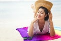 Summer woman relaxing in hipster beach hat and colorful sunglass Royalty Free Stock Photo
