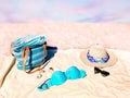 Summer  women  beachwear on white sand on horizon blue sky ,hat bag sunglasses and blue bikini on towel holiday vacation relax  ba Royalty Free Stock Photo