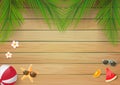 Summer wooden background with fresh palm leaf