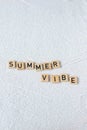 Summer word lettering on sand background, beach mood, copy space Royalty Free Stock Photo