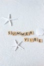 Summer word lettering on sand background, beach mood, copy space Royalty Free Stock Photo