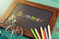 Summer - written with crayons on the chalkboard
