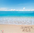 Summer 2018 written on the sand Royalty Free Stock Photo