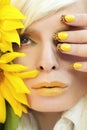 Summer yellow makeup and manicure. Royalty Free Stock Photo