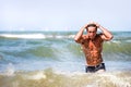 Summer. Young model man on vacation at sea. Royalty Free Stock Photo