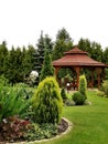 Summerhouse in the garden with chairs Royalty Free Stock Photo