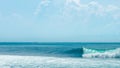 Beautiful summers day with nice wave breaking a perfect blue sky Royalty Free Stock Photo