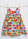 Summertime Baby Girl Dress on a Clothesline.