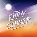 Summertime background with handwritten phrase Enjoy Summer.