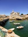 Summertime in Cascais - Fishing gear and boats with Seixas Palace in the background