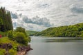 Summertime forests and mountain lake scenery in the Elan valley of Wales. Royalty Free Stock Photo