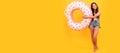 summertime kid weekend. sunbathing. summer vacation. happy girl inflatable doughnut ring. Banner of summer child girl in