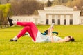 Summertime and leisure concept with young woman listening to mus Royalty Free Stock Photo