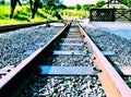 Summertime railway track and train station