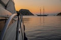 Summertime after sunset luxury yacht anchored in the Aponissos bay, Agistri island, Saronic gulf, Greece