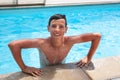 Summertime and swimming activities for happy boy on pool Royalty Free Stock Photo