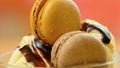 Vanilla ice cream macro closeup with chocolate sauce and macron cookies. Royalty Free Stock Photo