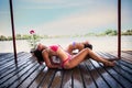 Summertime yoga couple of women doing yoga on river raft